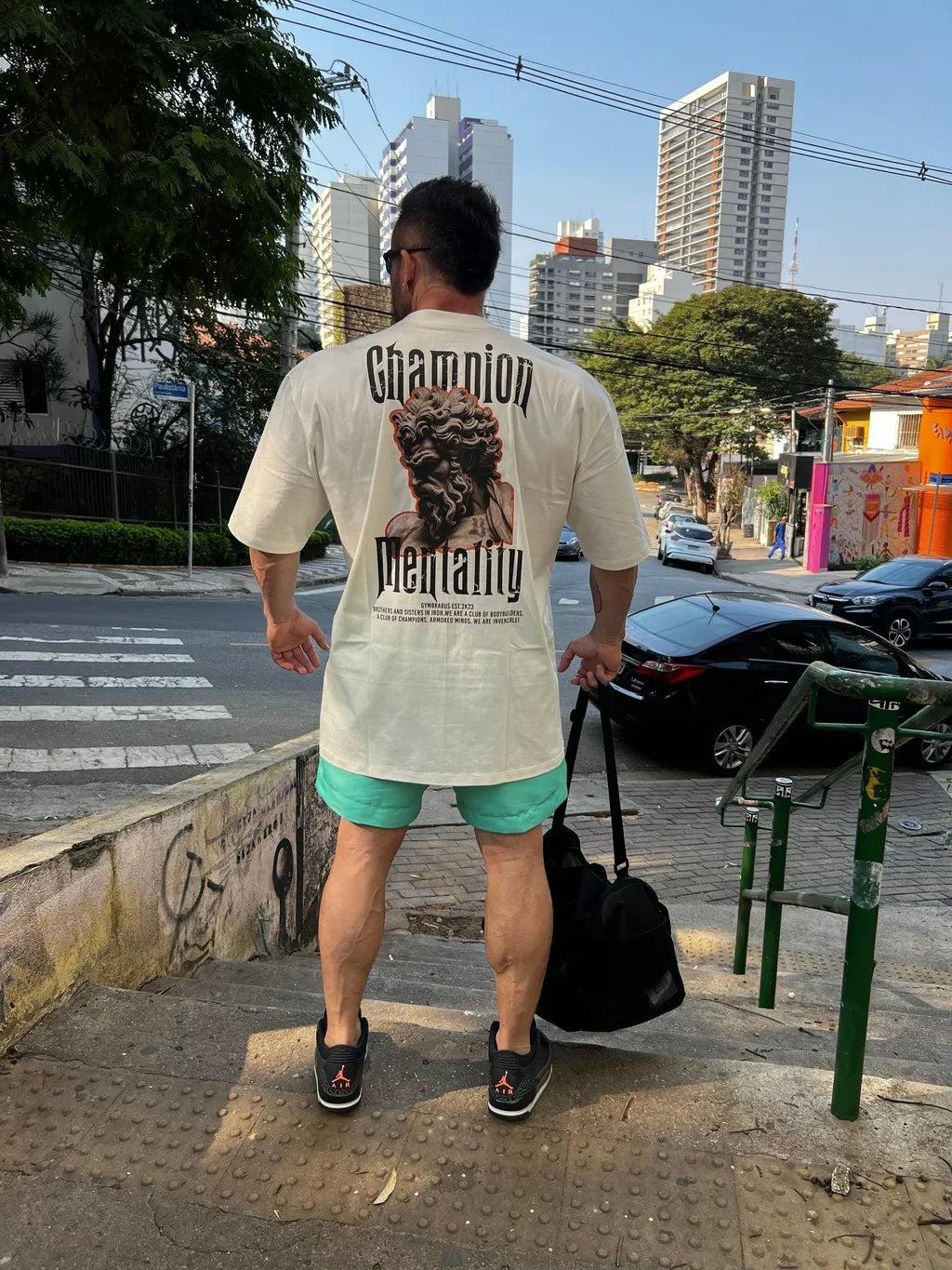 Camiseta Oversized Champion Mentality Zeus Off White